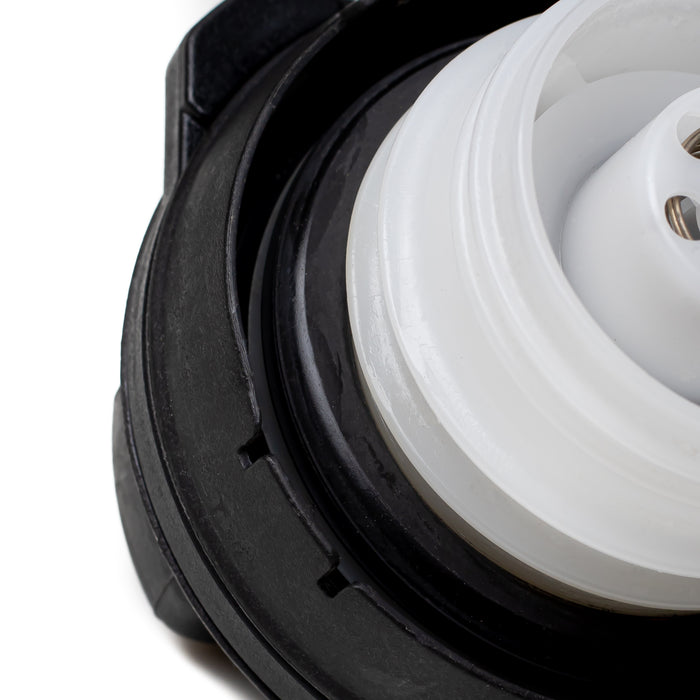 Close-up of a Honda Fuel Tank Gas Cap 17670-T3W-A01 showing a black plastic outer housing and a white plastic inner filter cone on a white background.