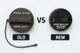 A side-by-side comparison of two black fuel cap removal covers labeled 'OLD' and 'NEW' with a large 'VS' between them, on a plain light background.