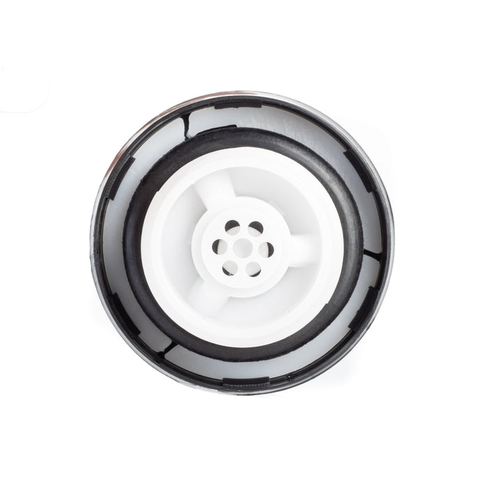 A Toyota Lexus Fuel Gas Cap 77310-48020 view from the top, featuring a white plastic inner cone with a central multi-hole design, surrounded by a black rubber gasket and a dark gray outer rim, on a solid white background.