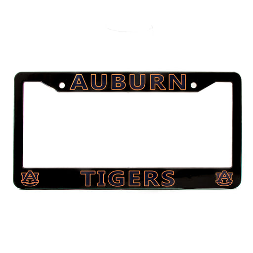 A black license plate frame featuring 'AUBURN' at the top and 'TIGERS' at the bottom in orange outline lettering, with Auburn Tigers 'AU' logos in the lower corners.