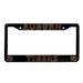 A black license plate frame featuring 'AUBURN' at the top and 'TIGERS' at the bottom in orange outline lettering, with Auburn Tigers 'AU' logos in the lower corners.