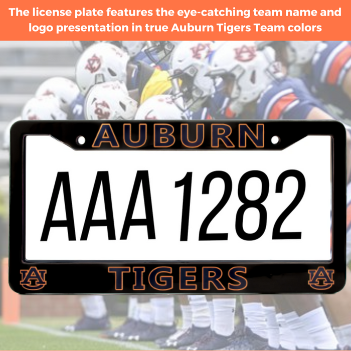 A custom Auburn Tigers license plate with a black frame, featuring the word 'AUBURN' at the top, placeholder license plate numbers 'AAA 1282' in the center, and 'TIGERS' with Auburn logos at the bottom. The background is a blurred photo of a football team in uniform.