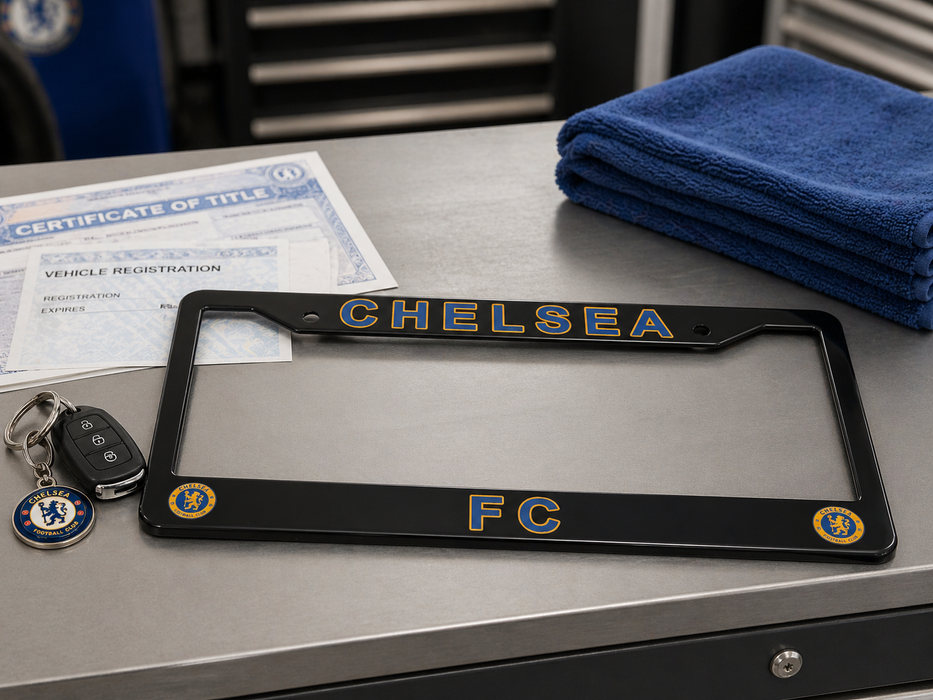 Chelsea FC license plate frame on a table with keys and certificate of title in the background