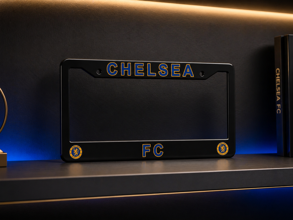 Black license plate frame with 'CHELSEA FC' text on a dark background