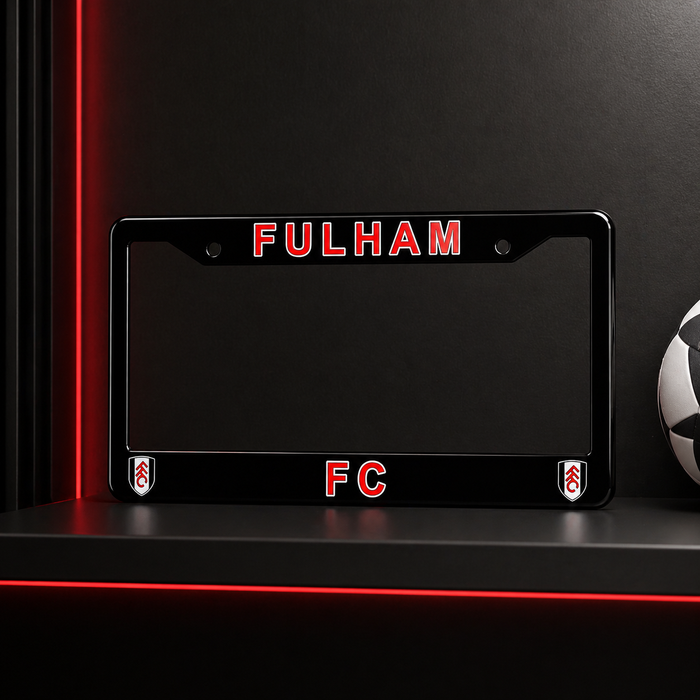 Black license plate frame with 'FULHAM FC' text on a dark background