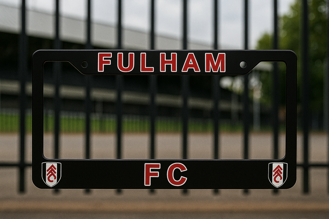 Black license plate frame with 'FULHAM FC' text and logos in front of a blurred background