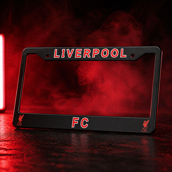 Black license plate frame with 'LIVERPOOL FC' text on a dark background with red smoke effect.