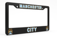 Black license plate frame with 'Manchester City' text and logo on a white background