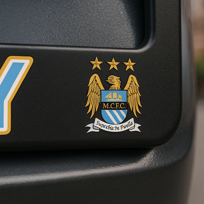 Man City FC logo on a black background