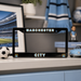 Black license plate frame with 'Manchester City' text on a shelf with sports-themed decor.