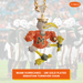 A Miami Hurricanes football-themed pendant necklace featuring a gold-plated Sebastian turn-over design covered in rhinestones, with an orange jersey, green lettering, and yellow accents. The background shows a blurred Miami Hurricanes football team scene, with an EliteAuto logo in the top right and a text banner at the bottom.