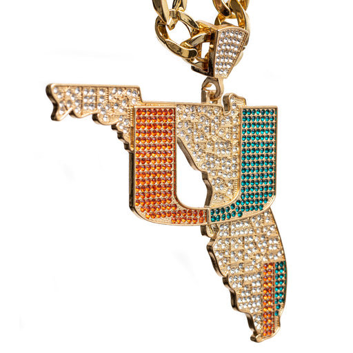 Gold-tone Florida state pendant necklace covered in rhinestones, featuring orange, white, and teal color blocking, shown on a white background.