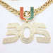 Gold chain necklace with a large '305' pendant and a 'U' charm embellished with red and green rhinestones, set against a plain white background.