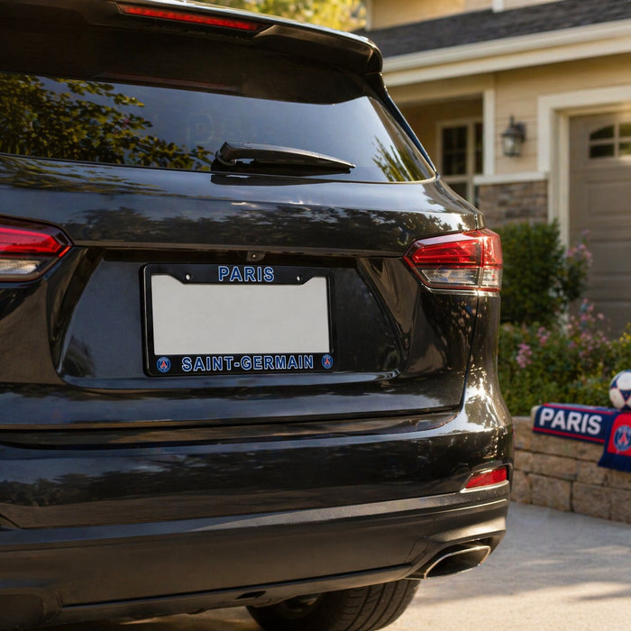 Black car with 'Paris Saint-Germain' license plate in front of a house