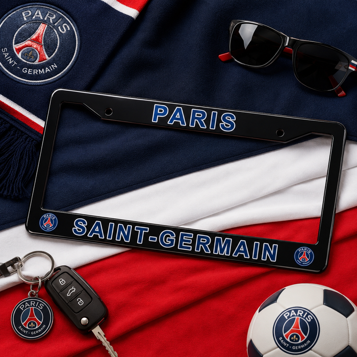 A black license plate frame with blue and white Paris Saint-Germain branding, styled on a red, white, and blue Paris scarf with sunglasses, keys, a soccer ball, and a Paris crest charm.