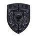 A black porsche emblem featuring a central bull head crest, two stylized ram horns curving inward, and the word 'ELITE' at the top, shown on a plain white background.