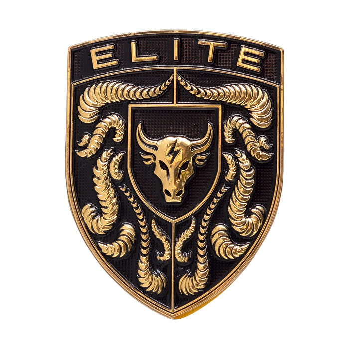 A metallic gold and black porsche emblem featuring the word 'ELITE' at the top, a golden bull head in the center, and crumrine designs around it, shown on a plain white background.