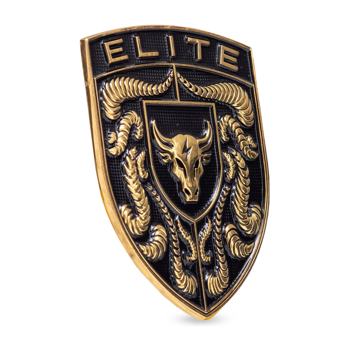 A black and gold porsche emblem featuring the word 'ELITE' at the top, a bull head in the center, and crumrine designs around it, shown on a plain white background.