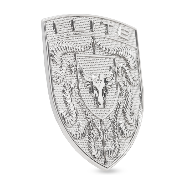 A silver-toned Chrome Silver Brahma Bull Hood Emblem featuring the word 'ELITE' at the top, a bull skull in the center, and ornate textured scrollwork below, shown on a plain white background.