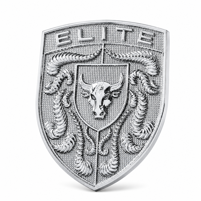 A silver-toned shield-shaped porsche emblem or badge featuring the word 'ELITE' at the top, a bull head in the center, and crumrine designs on a white background.