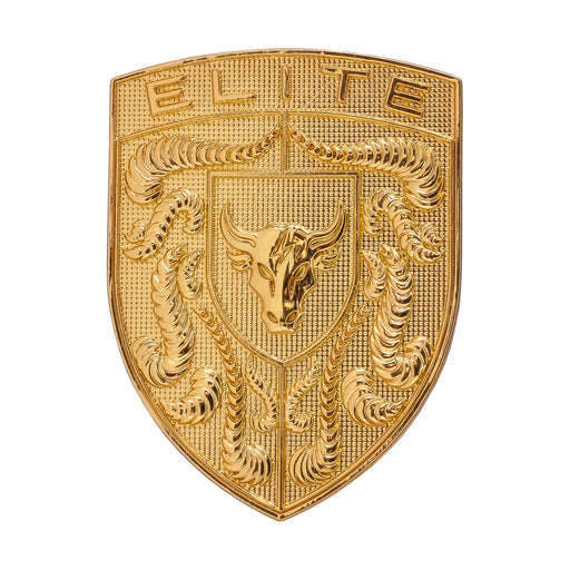 A gold porsche emblem or badge featuring the word 'ELITE' at the top, a central bull head, and detailed sculpted decorative elements on a plain white background.