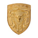 A gold porsche emblem or badge featuring the word 'ELITE' at the top, a central bull head, and detailed sculpted decorative elements on a plain white background.