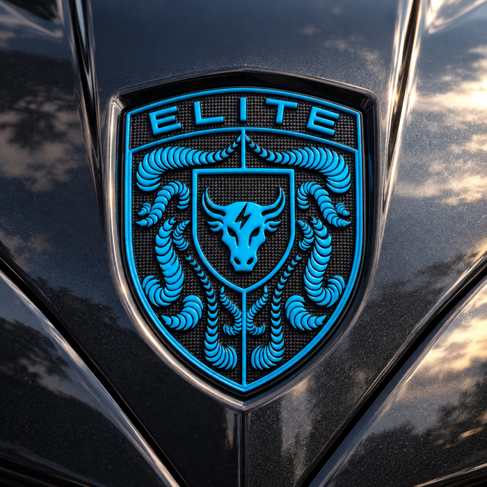 A close-up of a metallic shield-shaped emblem on a glossy black car body, featuring the word "ELITE" at the top and a stylized bull head surrounded by crumrine designs in bright blue against a black textured background.