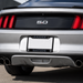 Close-up rear view of a silver Ford Mustang with a black license plate frame featuring the words 'RAIDER' at the top and 'NATION' at the bottom.