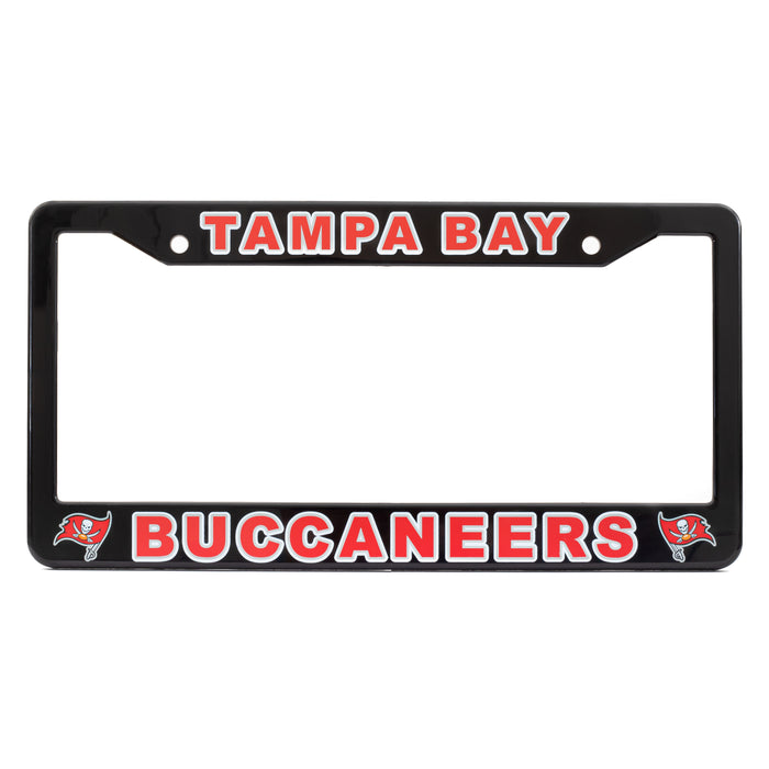 A black license plate frame featuring 'TAMPA BAY' in red letters with white outlines at the top and 'BUCCANEERS' in red letters with white outlines at the bottom, flanked by Tampa Bay Buccaneers logos on a white background.