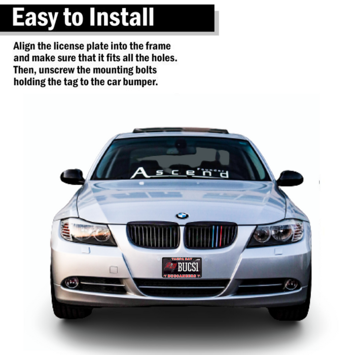 A silver BMW sedan shown from the front on a white background, with text at the top reading 'Easy to Install' and instructions about aligning a license plate frame and unscrewing mounting bolts. The windshield has a visible 'Ascend' decal, and the front bumper area is relevant to the installation context.